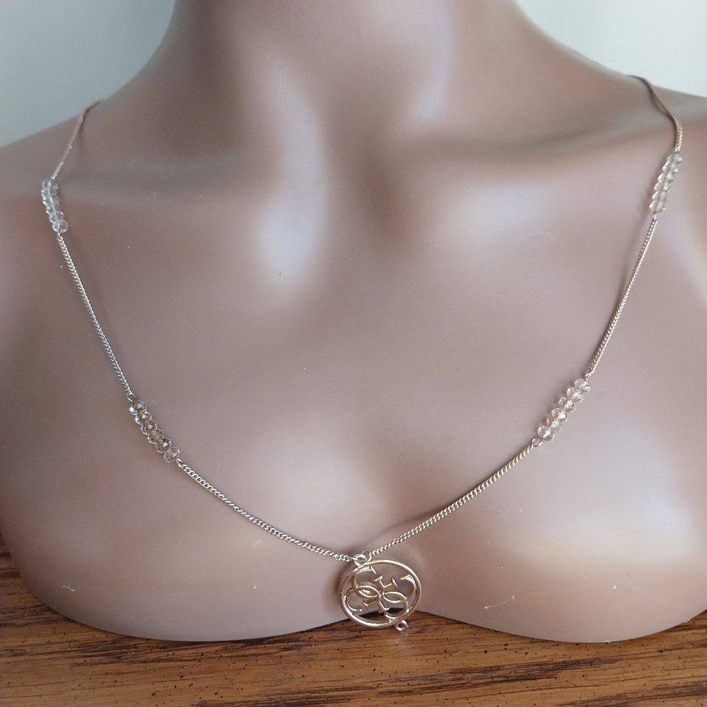 Guess Gold and Crystal Pendant Necklace - Picture 6 of 13